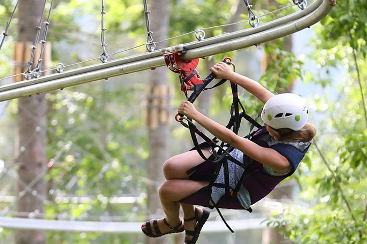 Enjoying a zipline adventure - Xplor Adventure Park